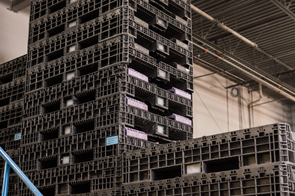 Bulk plastic containers in a warehouse