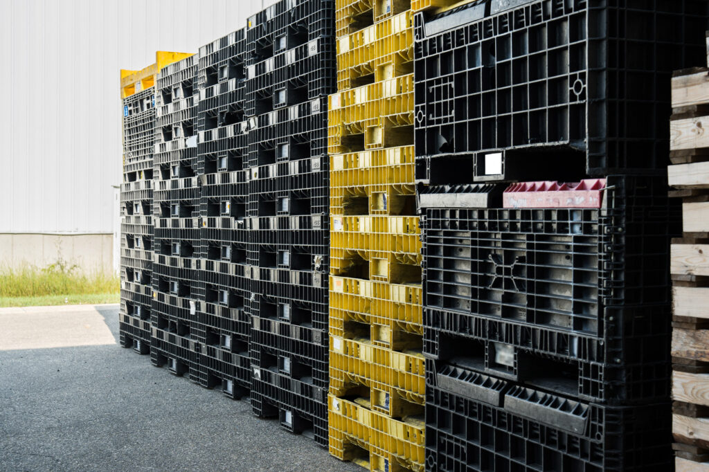 Stacks of plastic containers, ready to be repaired or shipped out